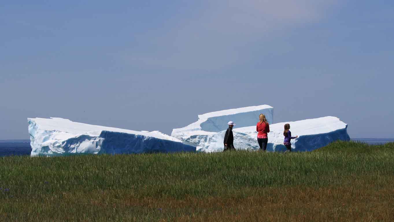 Three people walking and talking together, symbolizing annual flex benefits